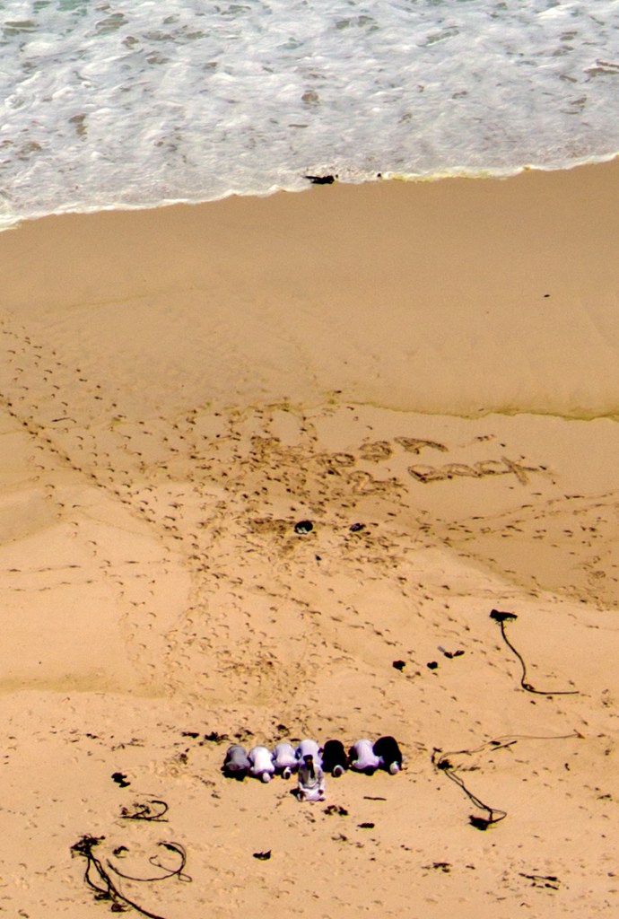 Islamic prayers on beach near cape town