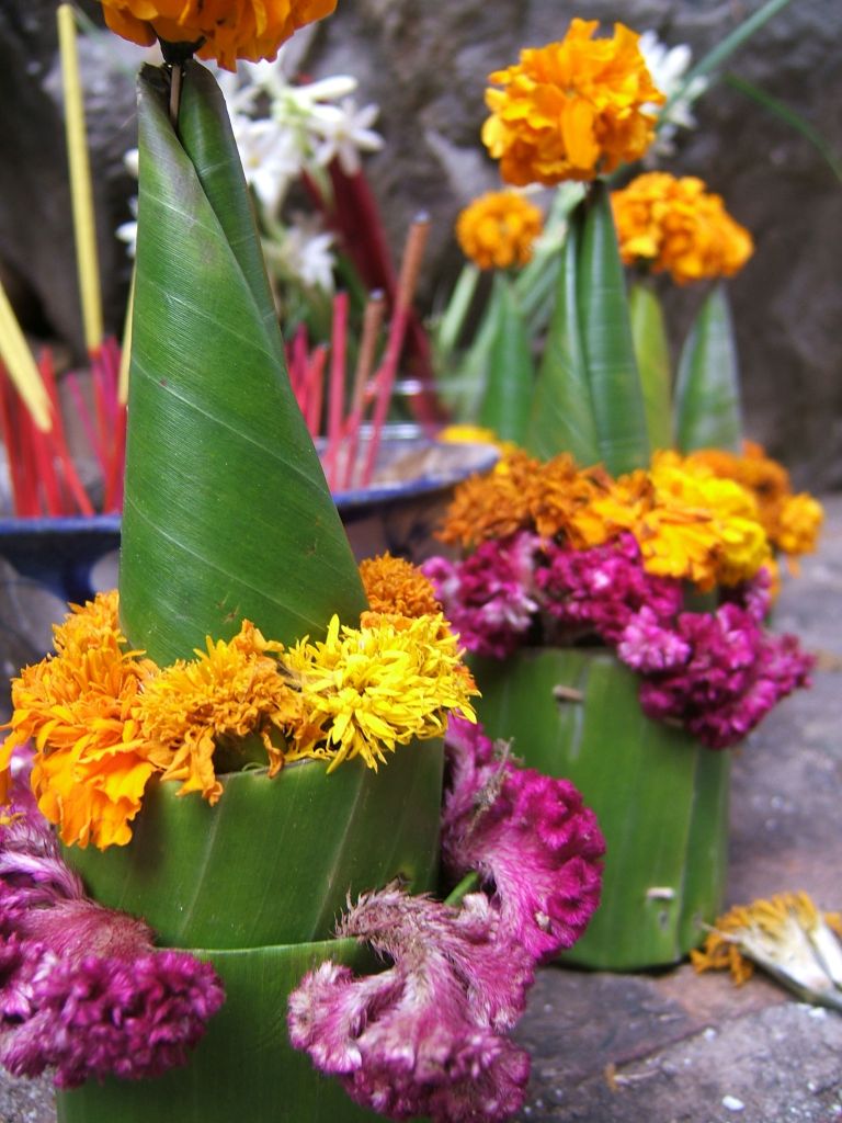 offerings at buddhist temple in luang prabang_