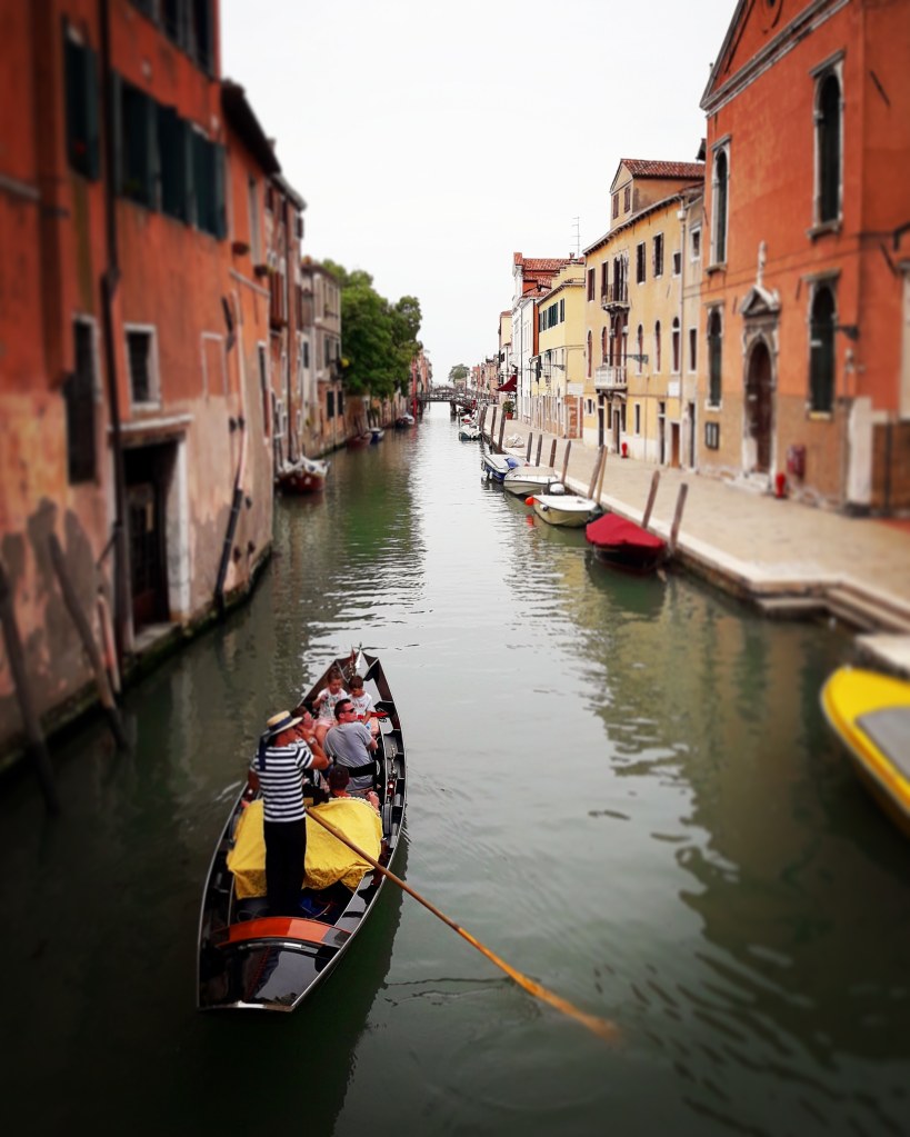 Venice Canal with gondola boat