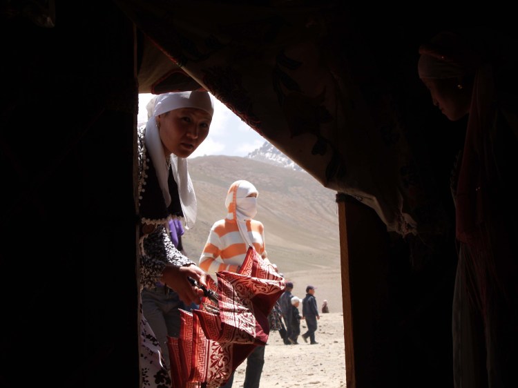Women looking into a yurt, Murghab Tajikistan